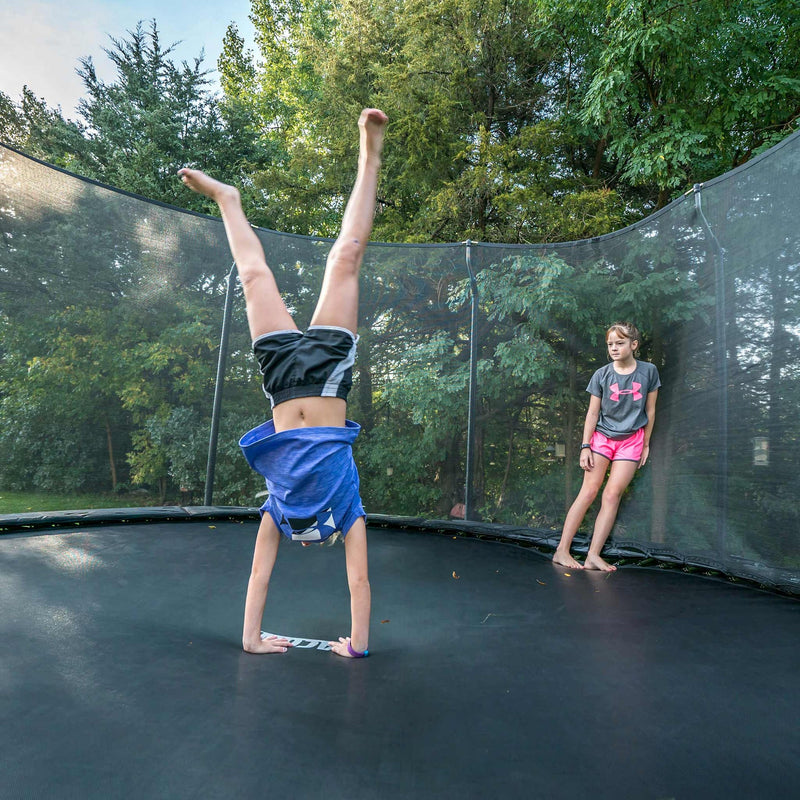 Load image into Gallery viewer, ACON Air 14ft Black Premium Trampoline with Net and Ladder Lifestyle 3 Marin Backyards
