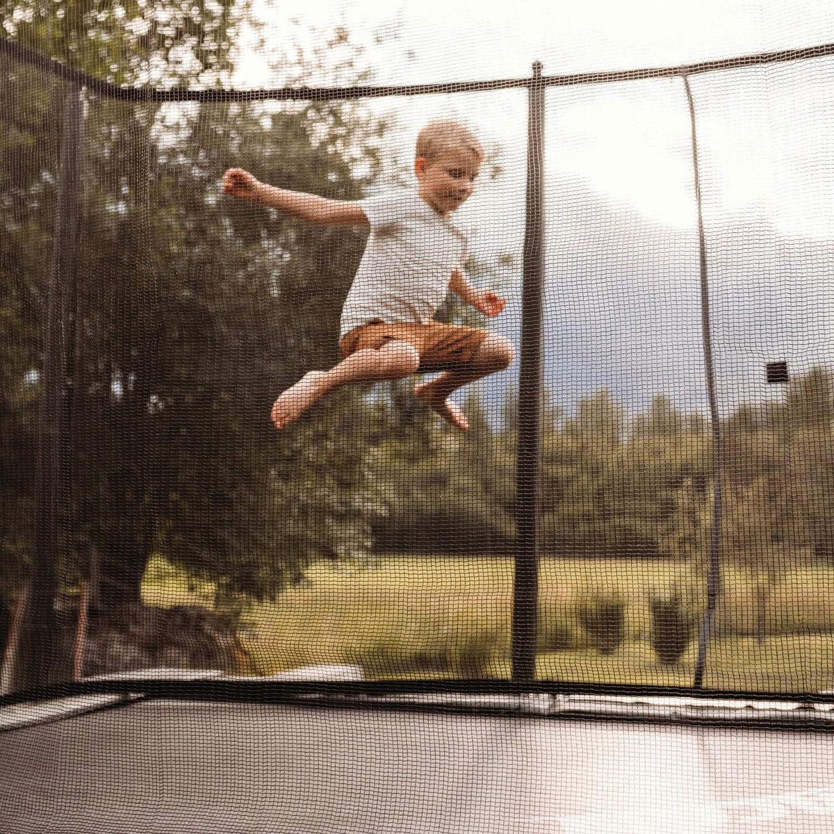 ACON Air 16 Sport HD Performance Trampoline with Net and Ladder Lifestyle 3 Marin Backyards